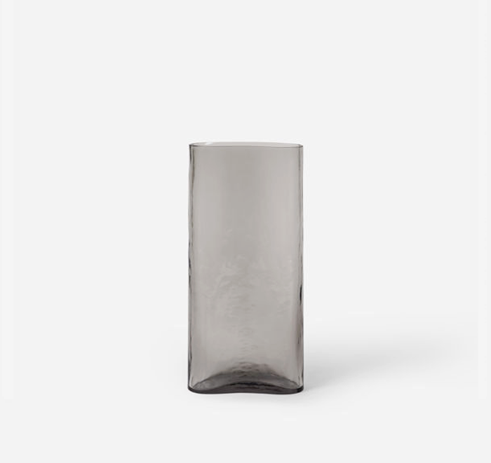 Smoky gray glass vase on a white background