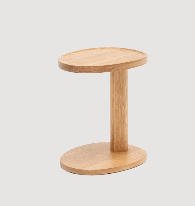Wooden side table on a light gray background