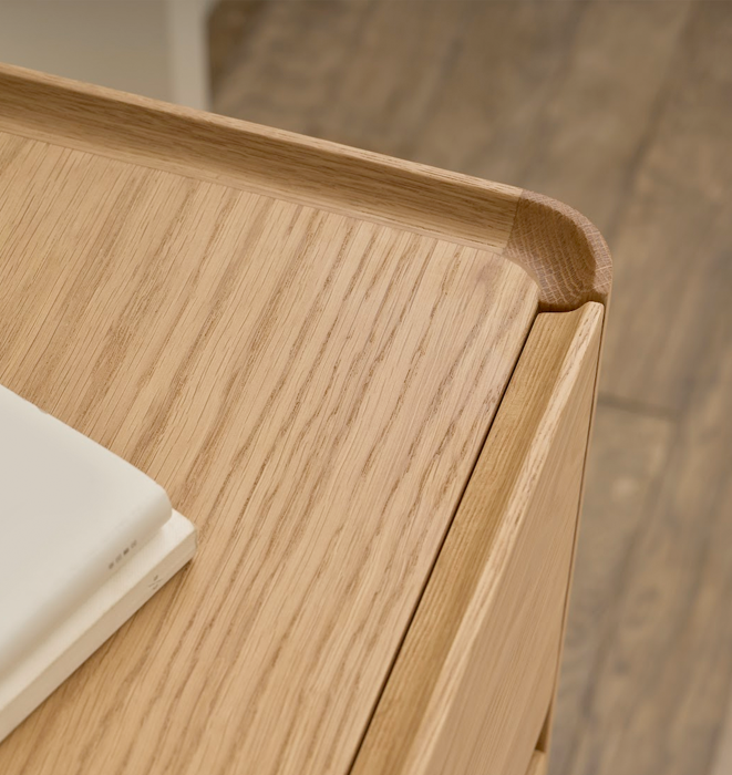Close-up of a wooden surface with a blurred background