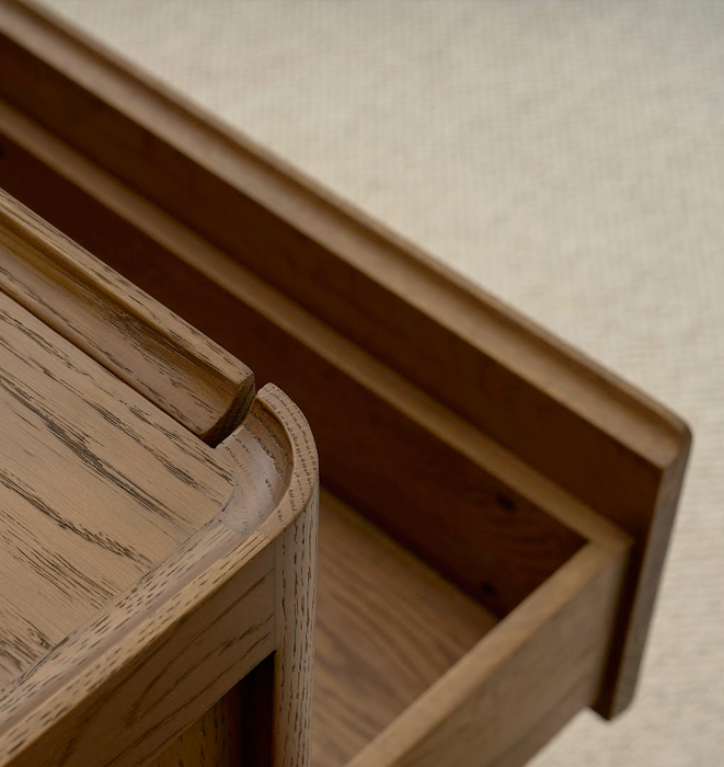 Close-up of a wooden shelf with a neutral background