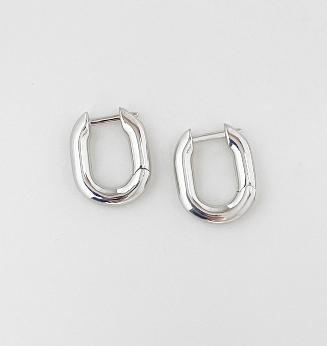 Silver Curved Hoop Earrings by Kartique